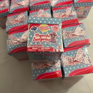 14 Popcake Surprise, new and in plastic